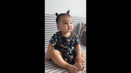 Baby’s hair band snaps causing funny hair moment in Astana, Kazakhstan