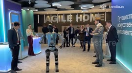 Putin examines Russian-made humanoid robot at AI Journey conference