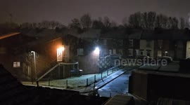 Heavy nighttime snowfall in Stanton Hill, England, UK
