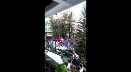 Students walk out of classes and gather in park chanting during anti-corruption protest