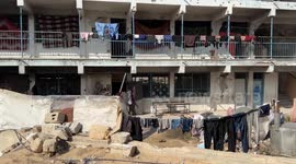 Flooded tents push Palestinians in Gaza into high-risk buildings along 'yellow line'