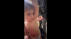 Blue Collar Husband Using Tool to Take Our Toddlers Temperature