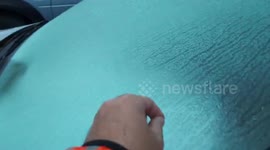 Spain: Freezing Temperatures Hit Spain, Causing Cars to Ice Over