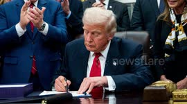 UNCAPTIONED: Trump Signs Bill Ordering Release of Epstein Investigation Files