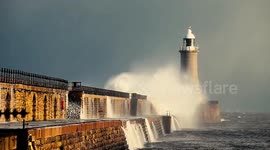 Waves Crash Over Tynemouth Pier As Britain Is Hit By Arctic Snap