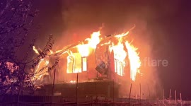 Massive blaze engulfs residential home as locals with officials work tirelessly to contain spreading flames