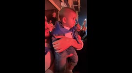 Child reacts fearfully to fireworks in Barcelona, Spain