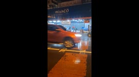 Siberian Husky rides like a human on a motorcycle, Thailand