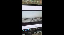 Car flips after losing control on slippery road in Heilongjiang, China