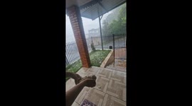 Heavy Hail Pelts Porch in Sarandi