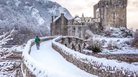 Snow falls on castle in Scotland but brave locals still donned kilts
