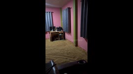 Farmer uses entire floor of her home for drying rice