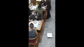 Restaurant owner redecorates cake and serves noodles after dessert falls off table