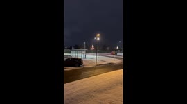 Neighborhood blanketed by heavy, swirling snowfall in Reykjavík, Iceland