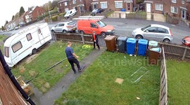 Father loses balance on skateboard in Manchester, England, UK