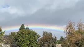 Vivid full rainbow after storm in Thousand Oaks, California, USA