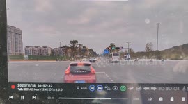 Motorcycle struck by car at intersection in Sichuan, China