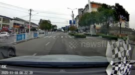 Black vehicles collide at intersection in Hubei, China