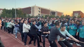 Teachers tumble after rope breaks in school tug-of-war in Jiangsu, China