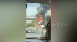 Transporter carrying new Tesla cars bursts into flames on motorway