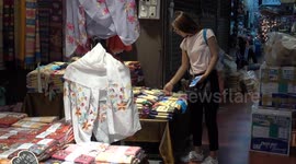 Market stalls sell beautiful selections of handmade Thai silk