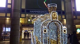 Visitors enjoy photos with Hammersmith Express as it adds sparkle to to Broadway shopping centre