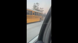 Cop Watching Baseball Game on Motorcycle