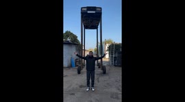 Man Drives Extremely Tall Car