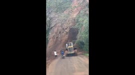 Landslide crashes onto road in front of shocked drivers