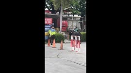 Black cow escapes and causes chaos near gas station in Karawang, Indonesia