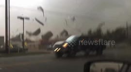 Utah Tornado Sends Debris Flying Across the Road