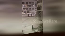 France: Silent Snowfall Transforms Colombes Courtyard In Midnight Storm