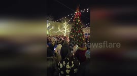 US: Christmas Tree Lighting Dazzles Crowds At Northville Parade