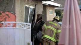 car crashes into riverside home