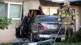 vehicle crashes into riverside home