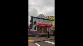 Black bear spotted on rooftop in Gatlinburg, USA