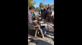 Bladesmiths pound knife steel creating rhythmic sounds