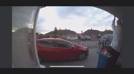 Girl tries to squash trash in bin but ends up falling flat instead