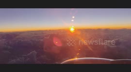 Aircraft recorded flying directly passing the sunrise at 30,000 from another aircraft