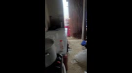 Jamaican family’s post-hurricane resilience goes viral as mom cooks through flooded makeshift kitchen