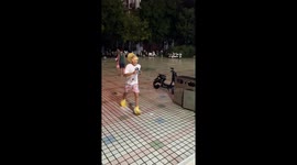 Man slips while delivering an umbrella to his friend stranded on a building