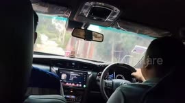 Crowd scatters as as police raid illegal cockfight in Thailand