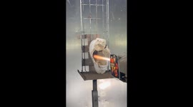 High-velocity HVOF spray turns sneaker Into flaming shreds