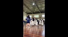 Catholic nuns play basketball at school sports event