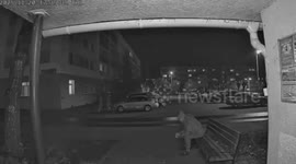 Large meteor lights up night sky as it shoots towards city