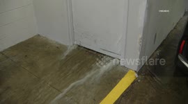 US, Los Angeles: Santa Clarita Sheared Hydrant Floods Apartment Complex and Elevator Lobby