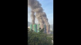 Hong Kong tower block fire flames and smoke engulf structures