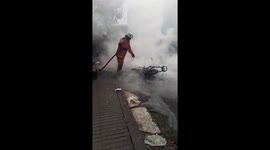 MOTOR ON FIRE BLOCKING THE ROAD