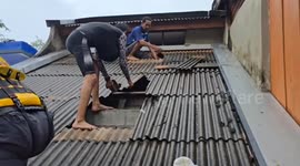 Newborn baby rescued from flood in southern Thailand