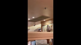 Chef terrifies customers by waving around Hamachi fish